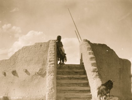 Tewa Indian guard at top of the kiva stairs, San Ildefonso, New Mexico 1905
