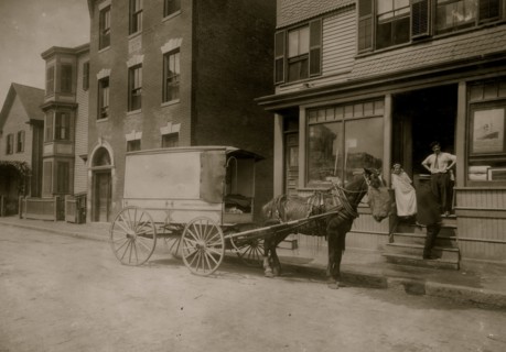 The wagon that delivers Home Work to Somerville, Mass. The owner of the wagon (who is not the driver) is O. H. Brown, 27 Main Street, Reading, Mass. These wagons (about 4 in all) are worked on commiss...