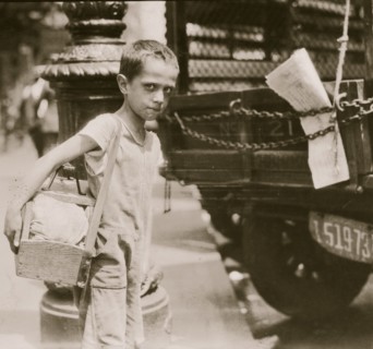 Tommie, very young shiner, Canal Street, New York City. 1924
