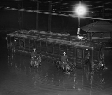 Trolley with Destination of the Treasury Department is partially underwater in Flood 1923
