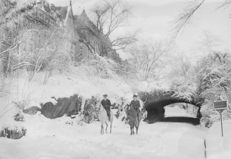 Two Horseback Riding during a Snowfall in Manhattan's Central Park
