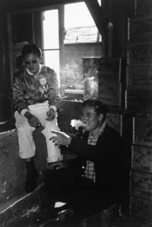 Two young men in co-op goods store 1943