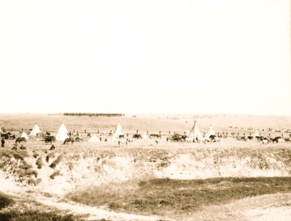 U.S. troops surrounding the Indians on Wounded Knee battle field 1913