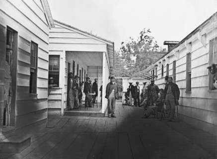 Washington, D.C. Convalescent soldiers and others outside quarters of the Sanitary Commission Home Lodge 1865