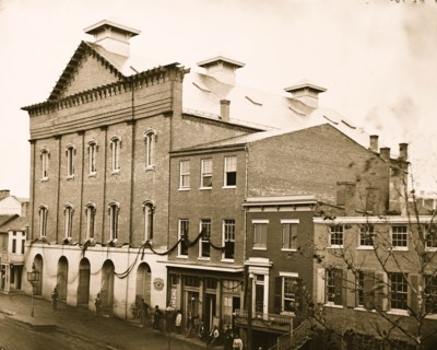 Washington, D.C. Ford's Theater with guards posted at entrance and crepe draped from windows 1865