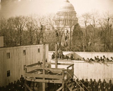 Washington, D.C. Hooded body of Captain Wirz hanging from the scaffold 1865