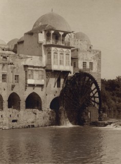 Water Wheel Ouside of Mosque turns by its passing River 1920