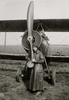 Woman hugs Plane Propeller