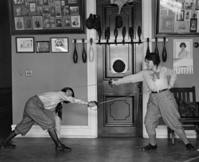 Women's Fencing in Gym as posed without Protection
