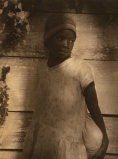 Young Black girl holding bag 1934