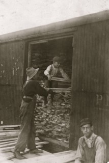 Young boy working for Hickok Lumber Co. Location: Burlington, Vermont. 1910