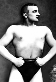 Bodybuilder with Thumbs Tucked in Belt
