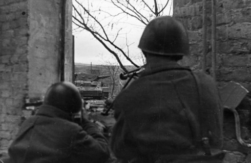 World war 2, battle of stalingrad, soviet anti-tank riflemen firing on an enemy tank on the outskirts of stalingrad, january 1943.