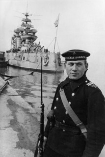 Black sea fleet, a soviet sailor on watch at the battleship paris commune, march 1943.