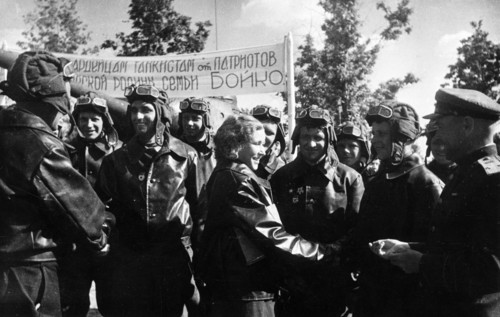 The boiko's tank unit receives new js-122 (joseph stalin 122) heavy tanks, 1942, tank commander,  junior lieutenant alexandra boiko and her husband, driver/mechanic ivan boiko being welcomed by their ...