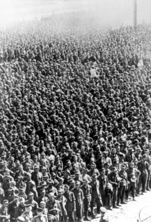 57,600 germans officers and men, taken prisoners on the byelorussian fronts wait for the train which will take them to a prisoners' camp.