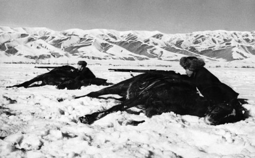 Training of red army reserves, the ossoaviakhim riding club of the kirghiz soviet socialist republic is training youths of call age and men undergoing universal military training, trainees firing from...