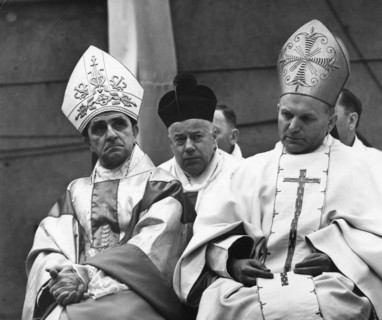 Cardinal karol wojtyla (later pope john paul 2) archbishop of cracow, poland (right), left: archbishop adam kozlowiecki from zambia, at eremonies to commemorate 25th anniversary of liberation of dacha...