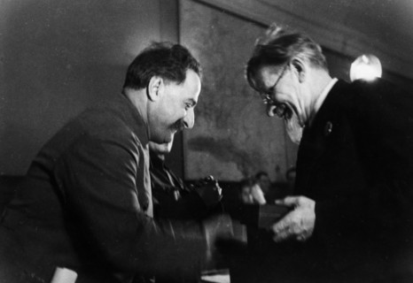 M, i, kalinin, president of the central executive committee of the ussr, awarding the order of the red banner of labor to grigoriy konstantinovich ordzhonikidze (sergo ordzhonikidze), the people's com...