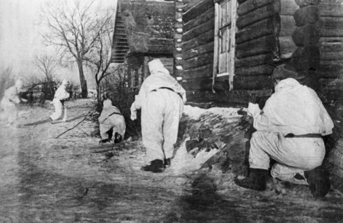 Scouts of the 'x' lithuanian unit dislodge germans from an inhabited locality on the first baltic front, world war 2, january 1944.