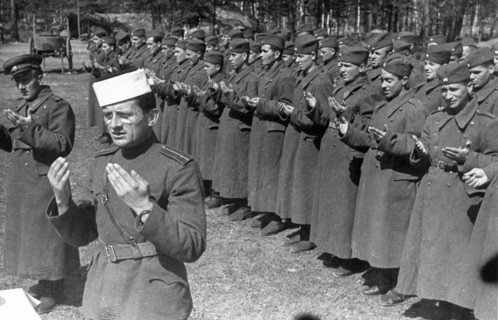 World war 2, yugoslavian military unit training in the soviet union, may 1944, islamic troops during morning prayers, being ministered by a mullah.