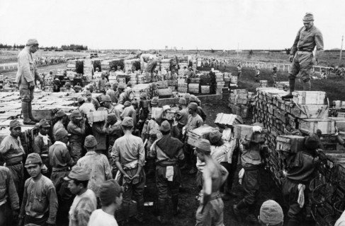 World war 2, harbin, japanese soldiers stacking ammunition to be turned over to the red army, 1945.