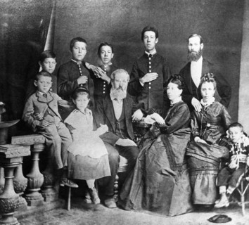 Chekhov family portrait, in the center, sitting, are the parents,pavel and yevgenia chekhov, on the left are mikhail and maria, on the right is aunt lyudmila with her son georgy, standing (from left) ...