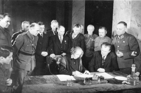 Second all-slav meeting in moscow, signing a message to the slavic peoples: at the table, stelia blagoeva, bulgarian leader (left), also pictured (l, to r,) are polish writer wanda wasilewska, compose...
