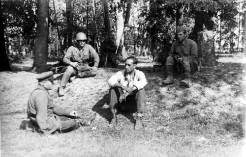 A red army officer questions nazi pilot herbert buschman who was captured after bailing out of his burning plane,the previous day he had attacked and set fire to a collective farm village, but returni...