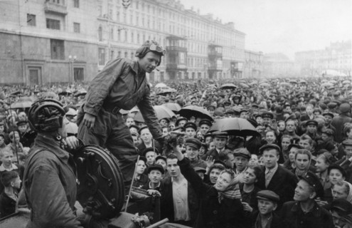 Victory parade in red square, moscow, ussr, june 24th, 1945, celebrating end of world war 2 in europe, moscow people greet soviet tank crew.