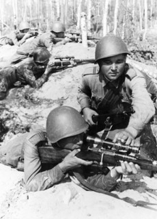Sargeant andrei lavenkov training new sharpshooters during the battle with finland, 1940s (late?).