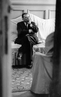 Soviet composer, dmitri shostakovich, backstage listening to the first performance of his 12th symphony 'the year 1917' being played by the leningrad philharmonic.
