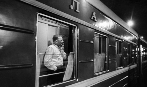 Soviet composer, dmitri shostakovich, on the train on his way home to moscow after the first performance of his 12th symphony 'the year 1917' by the leningrad philharmonic.