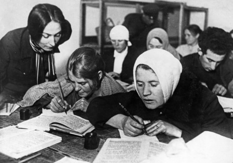 Soviet women being taught to read and write during a literacy drive in the early 1930s, ussr.