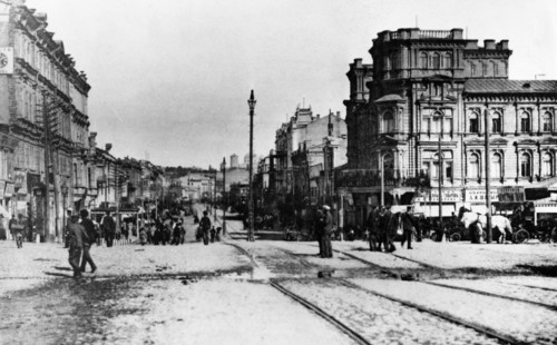 A street in kiev, ukraine at the turn of the century (late 1800s or early 1900s).