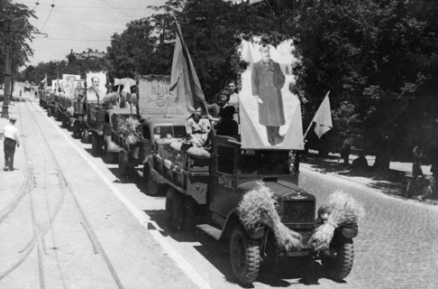 Collective farmers of the odessa region riding to the state elevators with a load of newly harvested grain, ussr, august 1947.