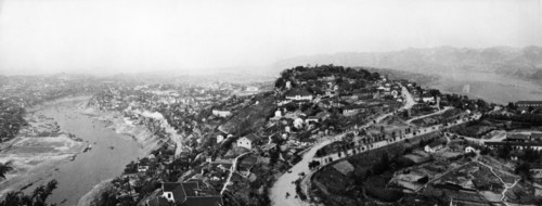 A view of chungking, leading industrial and trade center in southwest china, surrounded on three sides by rivers, early 1950s.