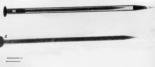 Top: x-ray photograph of one of the poison pins gary powers was provided with (enlarged 9 times), figure 2: inside needle of the pin with the grooves filled with poison, bottom: actual size of poison ...