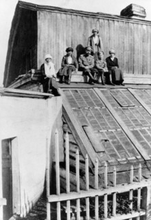 tsar nicholas ll with his family (son, alexei and daughters, olga, maria, anastasia and tatiana) on the roof of the house in tobolsk where they were held in 1918 before being transferred to yekaterinb...