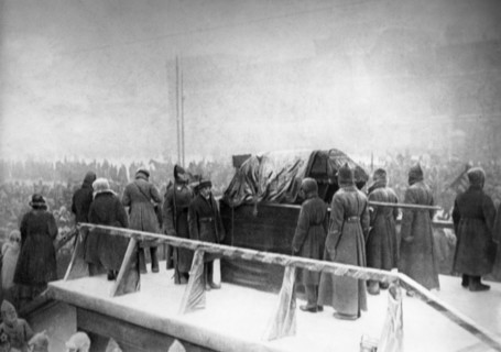 Lenin's funeral, members of the politburo carrying the casket into the crypt near the kremlin wall in red square, moscow, january 1924.
