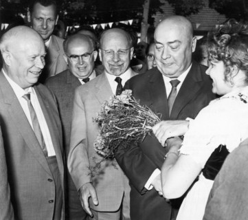 Soviet premier nikita khrushchev, gdr state council chairman walter ulbricht, and the minister council chairman of poland jozef cyrankiewicz being welcomed with flowers in the town hall of frankfurt p...