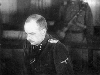 World war 2, december 15, 1943, still from a film on the kharkov trial produced by artkino, unterzturnfurher, ss hans ritz, deputy commander of the ss company of the 'sonderkommando sd' in the docket ...