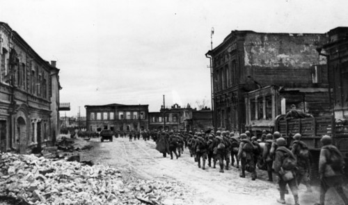 World war 2, battle of stalingrad, reinforcements marching through the streets of stalingrad on their way to the front lines.
