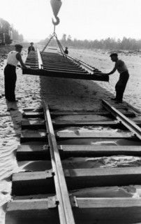 Workers laying track for the 400-mile abakan-taishet railroad through the sayan mountains in siberia, 1960.