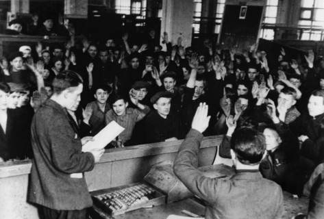 Show trials, workers of the dynamo works named after kirov voting to adopt a resolution demanding the execution of trotskyist spies, 1937.