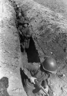 Soviet tommygunners passing along a communication trench before an attack on the soviet-german front, september 1942.