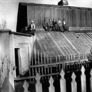 tsar nicholas ll with his family (son, alexei and daughters, olga, maria, anastasia and tatiana) on the roof of the house in tobolsk where they were held in 1918 before being transferred to yekaterinb...