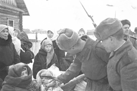 World war 2, battle of stalingrad, red army soldiers with civilians on the outskirts of stalingrad.
