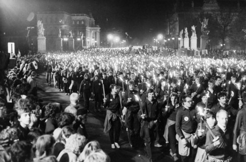 A torchlight procession of free german youth organization members in honor of the 35th anniversary of the gdr on unter der linden avenue in berlin, october 10, 1984.
