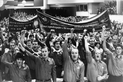 Free german youth organization, a meeting at a youth conference in berlin in which a resolution to make every effort to have the gdr host the next world youth festival is adopted unanimously, october ...